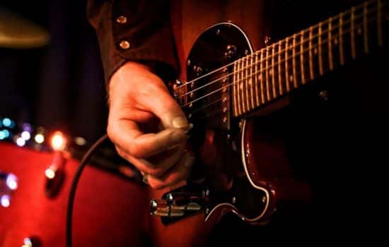 Tocar Guitarra: Mejora tus Habilidades Musicales con Tecnología